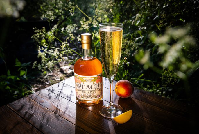 peach liqueur cocktail the caen