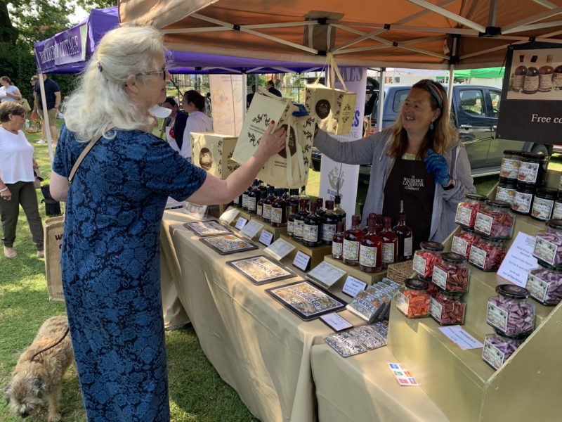 Tiffinie Pride, director and owner of The Wiltshire Liqueur Company sells liqueurs at a roadshow event.