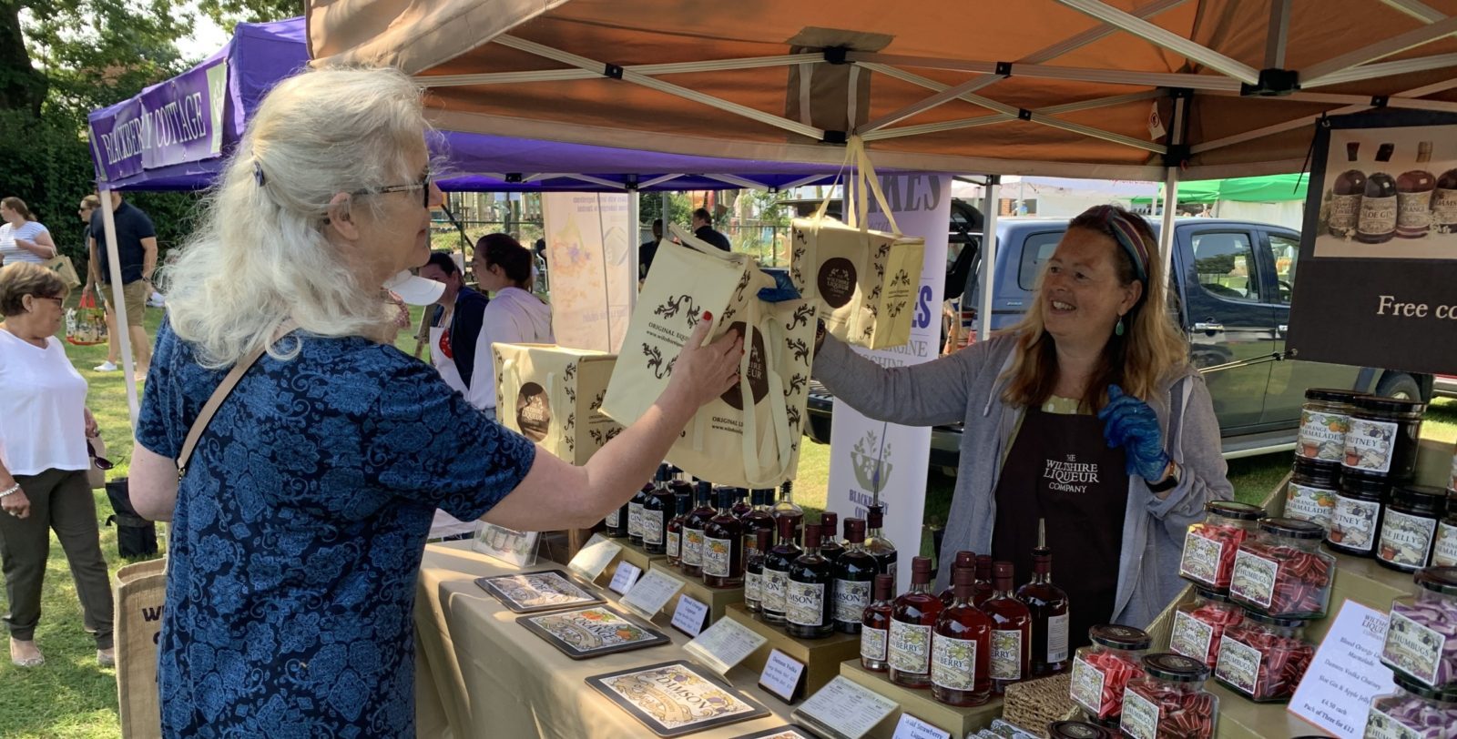 Tiffinie Pride, director and owner of The Wiltshire Liqueur Company sells liqueurs at a roadshow event.